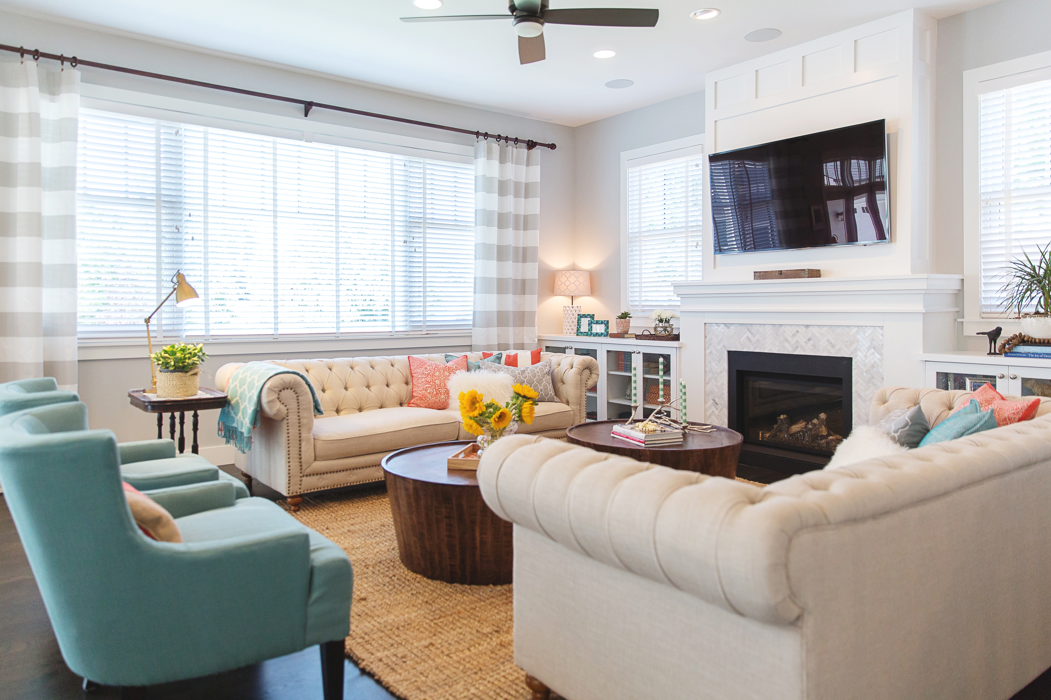 boise new home, north end new home, turquoise and coral interior, tufted sofas, boise interior design